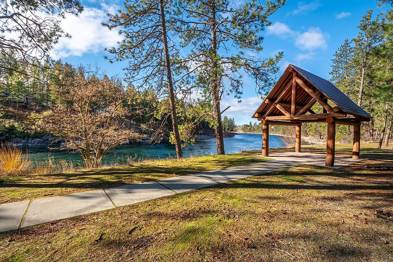 A log gazebo sits in Corbin Park overlooking the Spokane River in Post Falls, Idaho. 