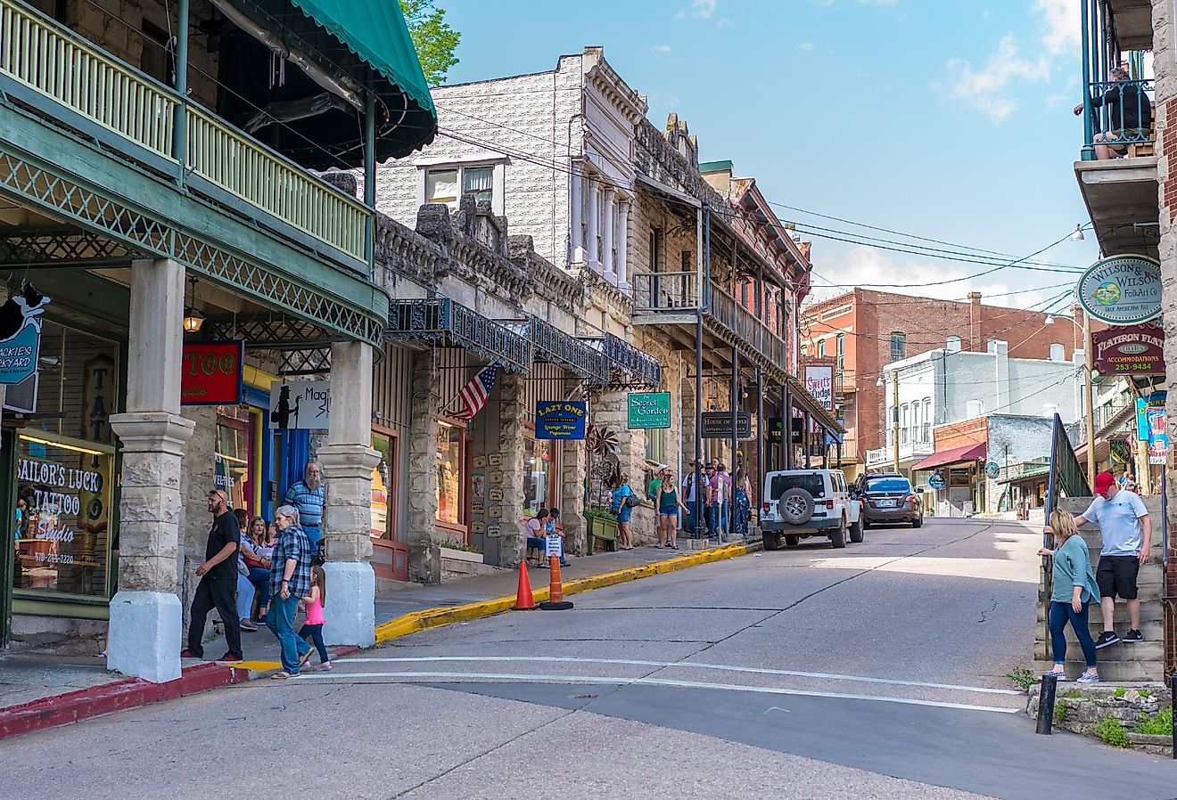 People walking in downtown Eureka Springs, Arkansas. Image credit shuttersv via Shutterstock