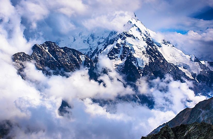 Dykh-Tau pierces through the cloud cover over the Russian Caucasus.