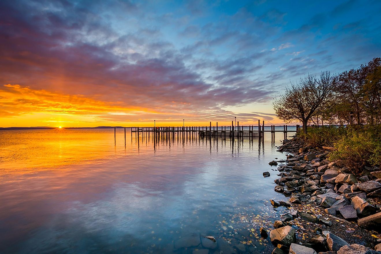 Sunrise over dock and the Chesapeake Bay, in Havre de Grace, Maryland.