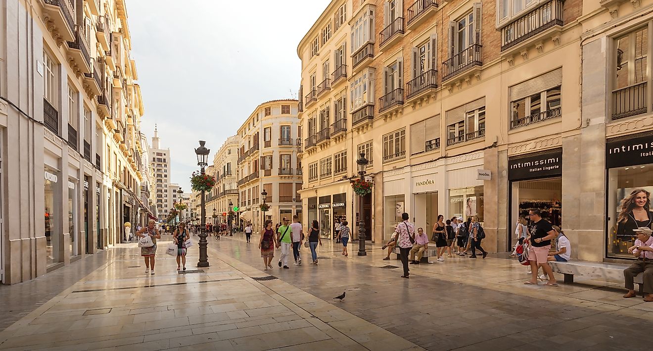 Calle Marques de Larios is a pedestrian and shopping street in Malaga. Editorial credit: BAHDANOVICH ALENA / Shutterstock.com