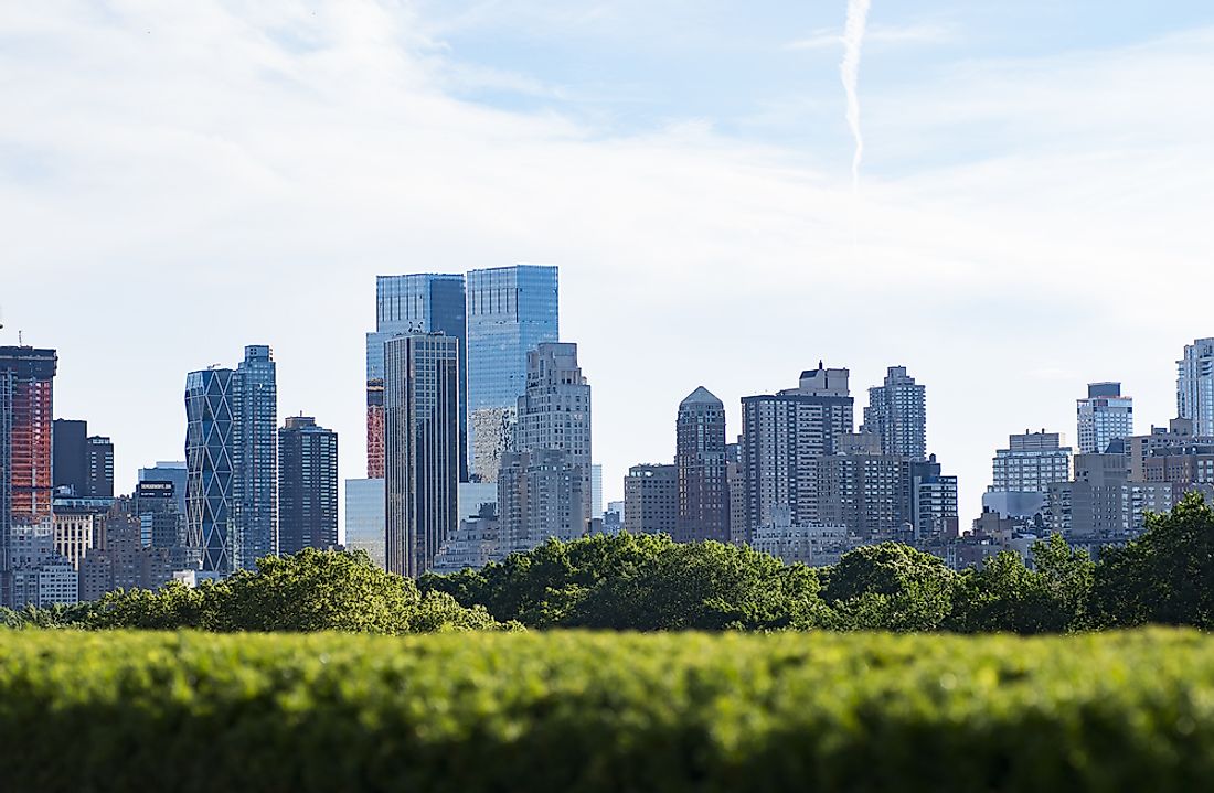 New York with the green rooftop of the Met in the foreground. 