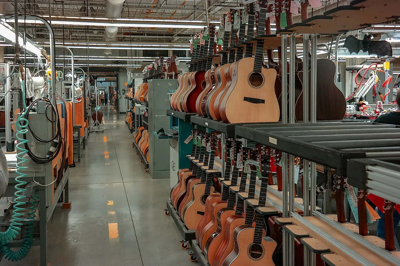 : Guitars on the assembly lines in the factory of the Martin Guitar Company Editorial credit: George Sheldon / Shutterstock.com