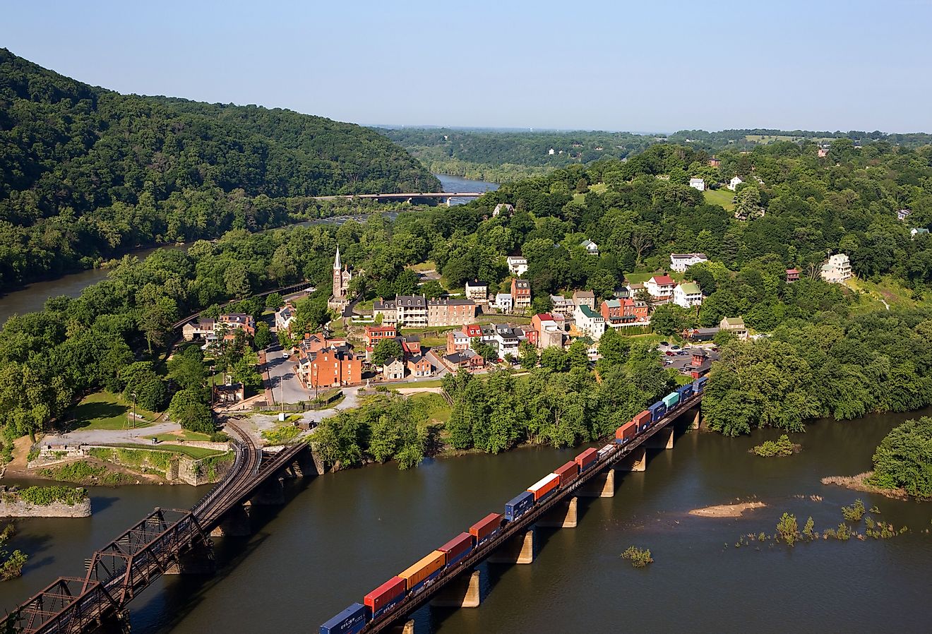 A train rolls across the Shenandoah River in an aerial view of the town of Harpers Ferry, West Virginia.
