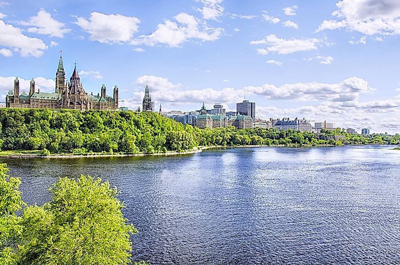 Canadian Parliament building along the banks of the Ottawa River.