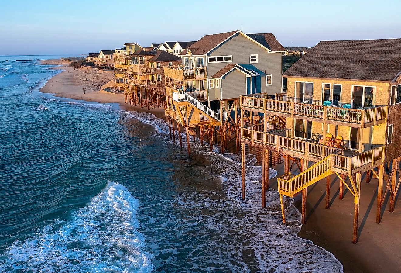 Aerial view of homes on the shoreline during high tide in Buxton, North Carolina, Outer Banks.