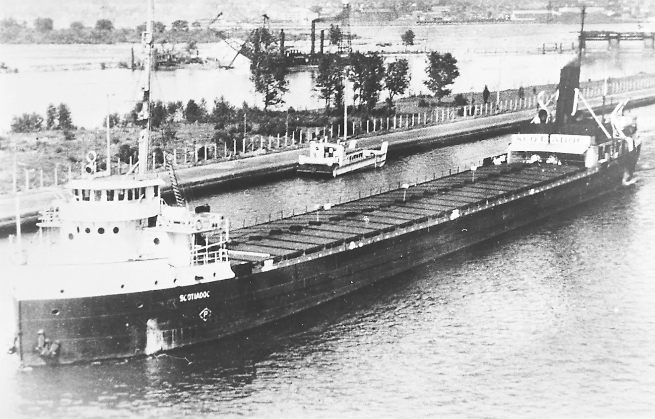 The steamer Scotiadoc underway. By Young - https://images.maritimehistoryofthegreatlakes.ca/133374/page/6?q=scotiadoc&docid=MHGL.133374, Public Domain, https://commons.wikimedia.org/w/index.php?curid=112641959
