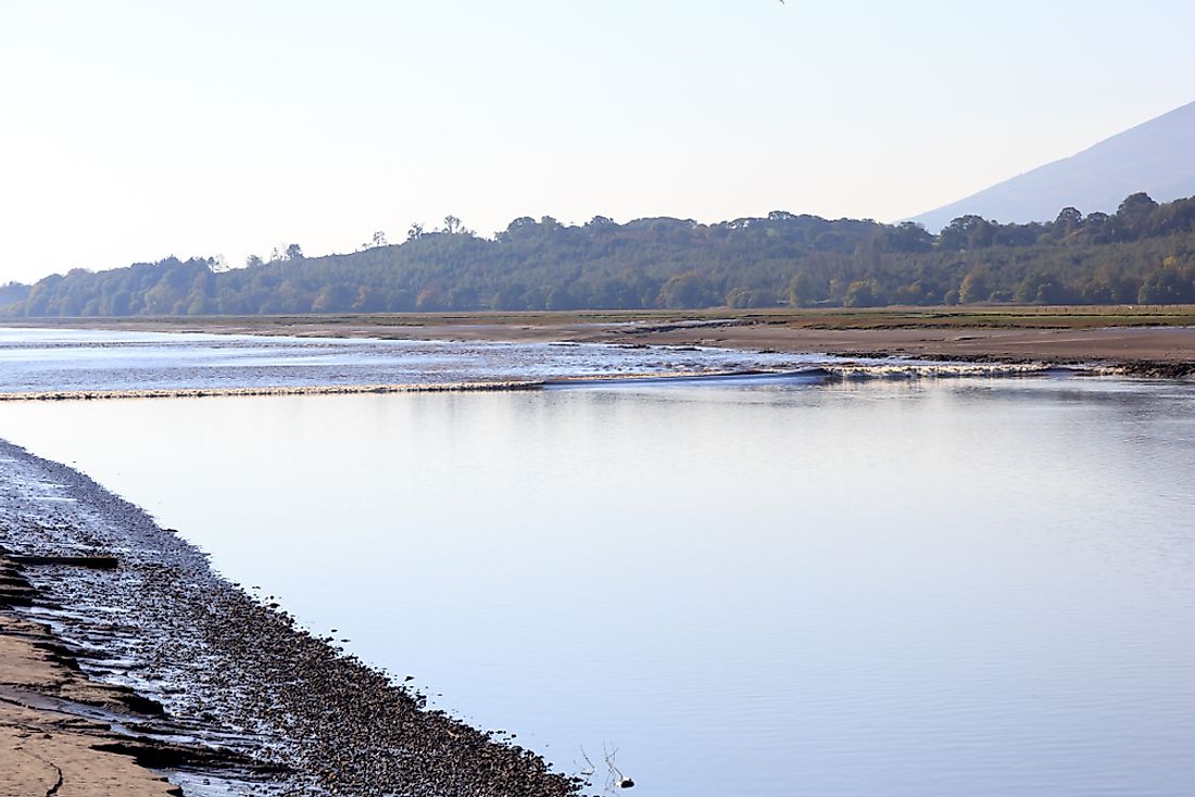 Tidal bore at the mouth of the River Nith in Scotland.