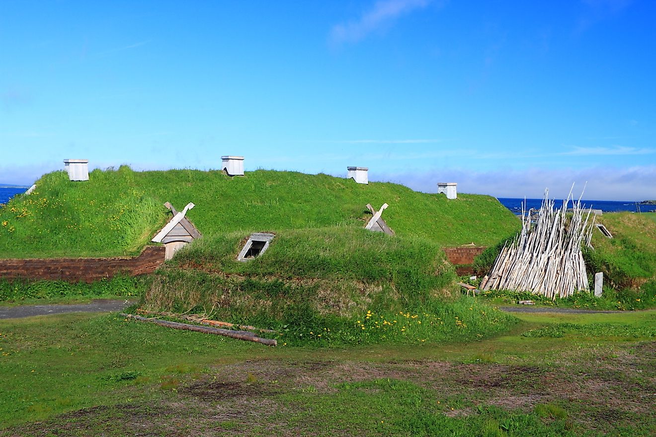 Ancient homes of Viking settlers in L'Anse aux Meadows National Historic Site on the island of Newfoundland, Canada. Image credit: George Burba/Shutterstock.com