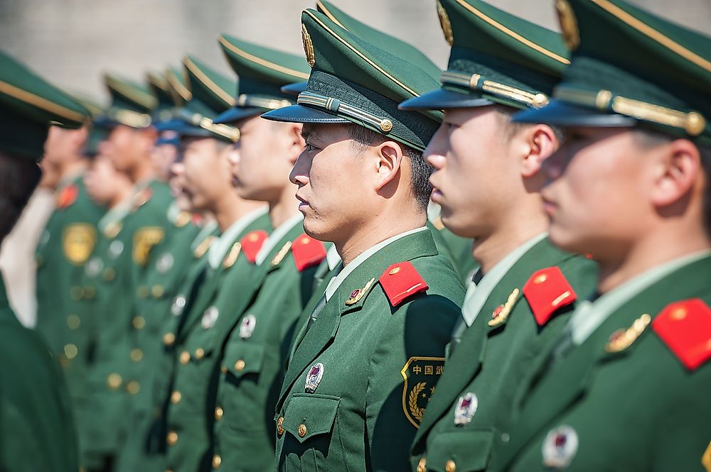 Chinese soldiers attend a parade at Tiananmen square on November 8, 2012 in Beijing, China. Credit: Hung Chung Chih / Shutterstock.com