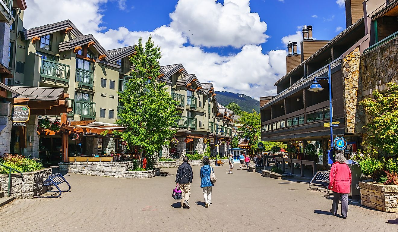 ourists exploring the town of Whistler, British Columbia. Editorial credit: Volodymyr Kyrylyuk / Shutterstock.com.