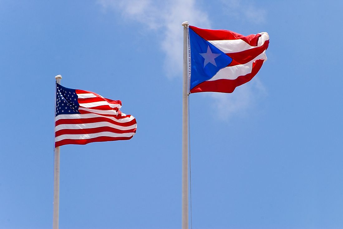 Flags of the United States (left) and Puerto Rico (right).