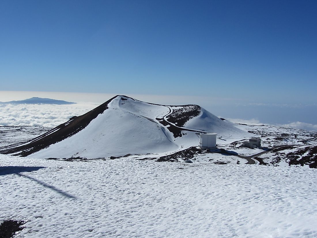 A volcanic crater covered in snow on the Big Island of Hawaii. 
