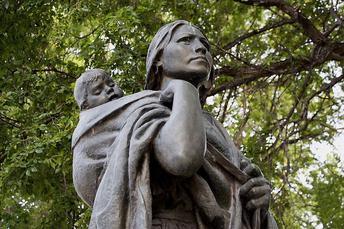 A statue of Sacagawea in Bismark, North Dakota. Editorial credit: Ace Diamond / Shutterstock.com.