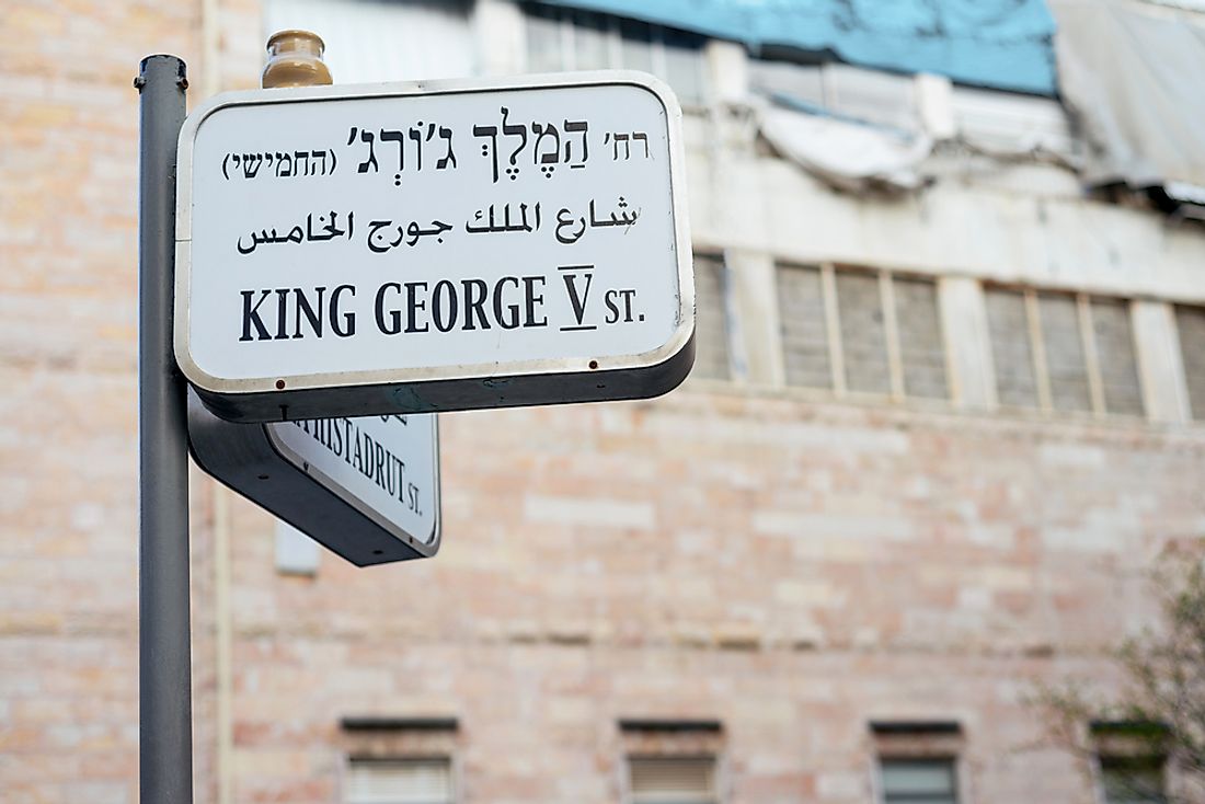 Street sign in Jerusalem in Hebrew, Arabic, and English languages.