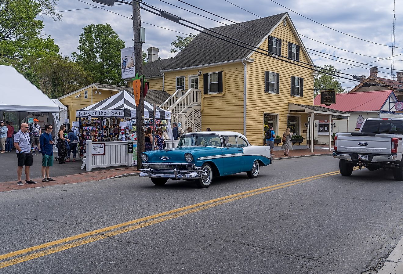 Tourists taste local wine specialties at WineFest, St. Michaels, Maryland. Image credit tokar via Shutterstock