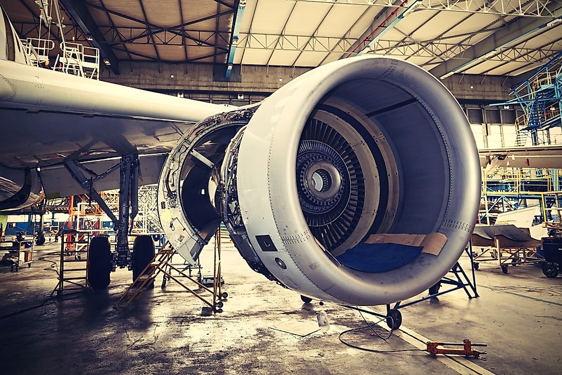 An airplane engine under maintenance. 
