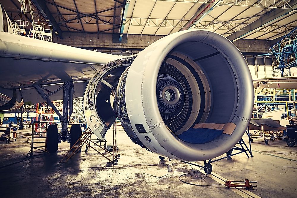 An airplane engine under maintenance. 