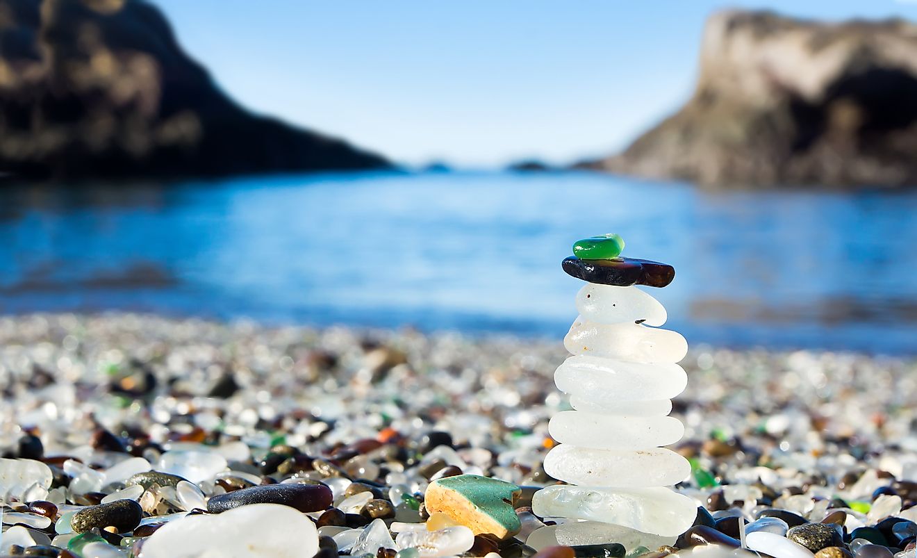 The bits of sea glass now giving Glass Beach its name have been largely smoothed out over time as a result of oceanic activity, allowing them to be touched and even turned into new pieces of art.
