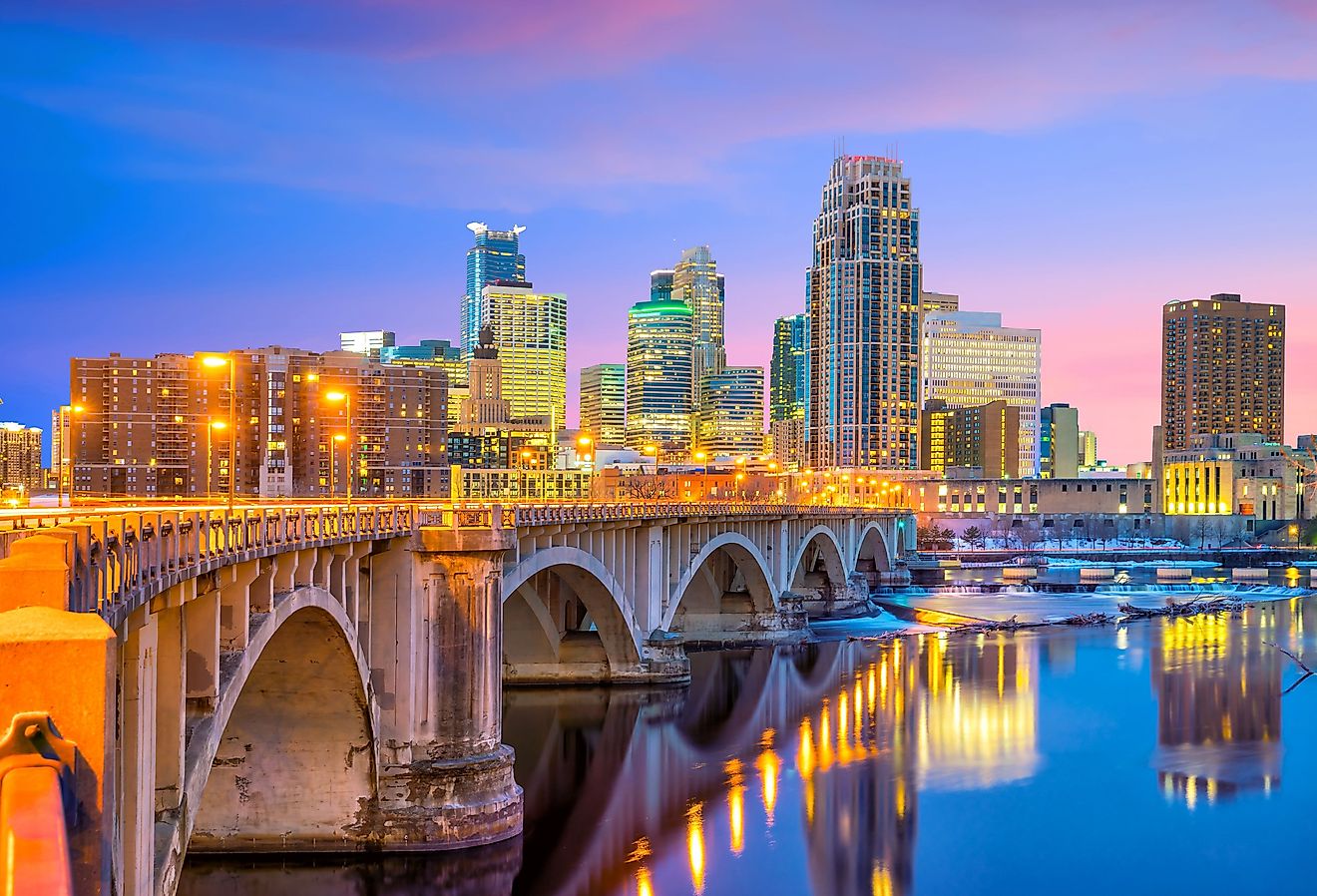 Minneapolis downtown skyline in Minnesota at sunset. Image credig f11photo via Shutterstock.