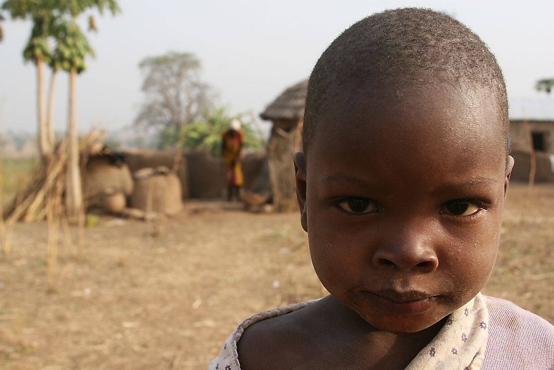 A young girl, whose mother was accused of sorcery, living at the Gnani Witch Camp. Editorial credit: Vladimir Dvoynikov / Shutterstock.com