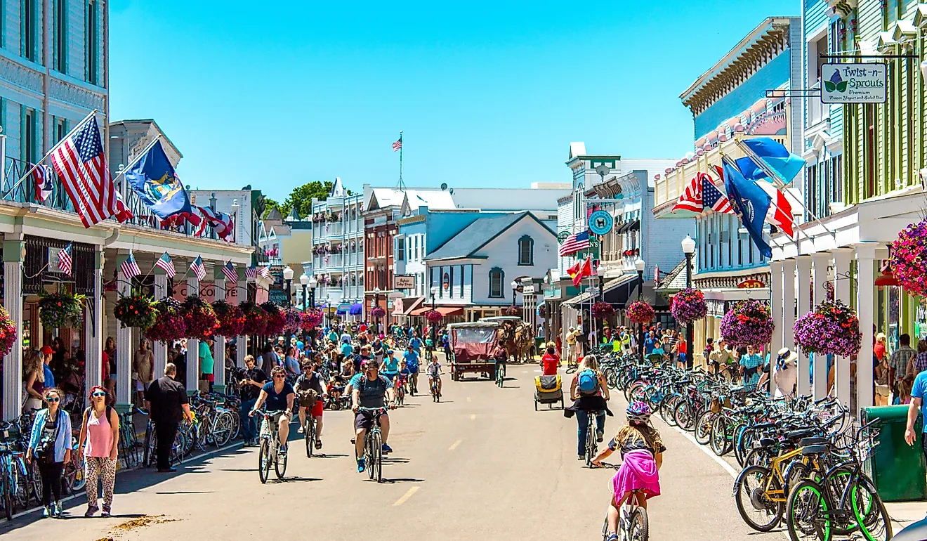 A busy day in downtown Mackinac Island, Michigan. Image credit: Michael Deemer via Shutterstock.com.