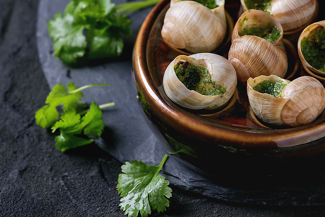 "Escargots de Bourgogne" - traditional French food consisting of snails and herbs. 