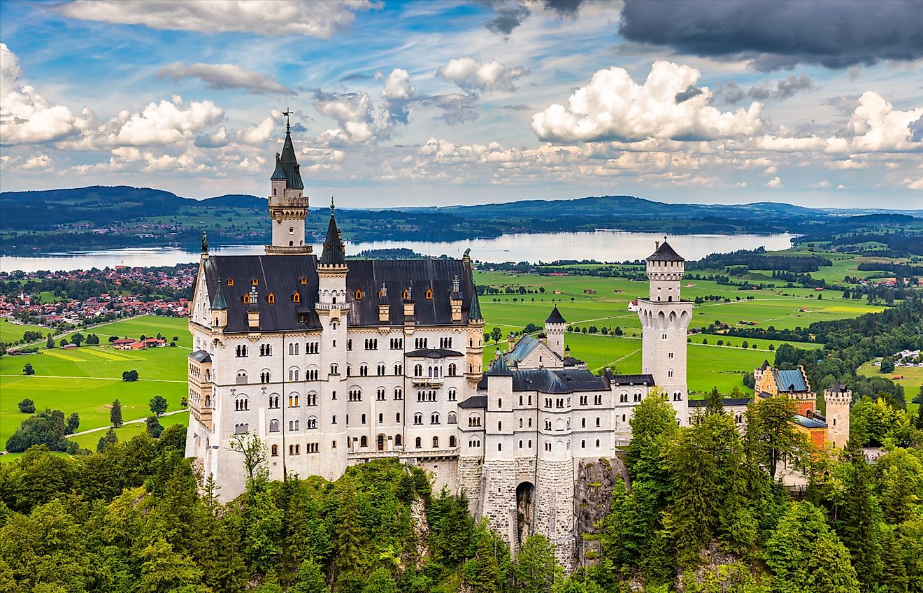 Neuschwanstein Castle near Füssen in Bavaria, Germany, overlooking the village of Hohenschwangau in the Bavarian Alps