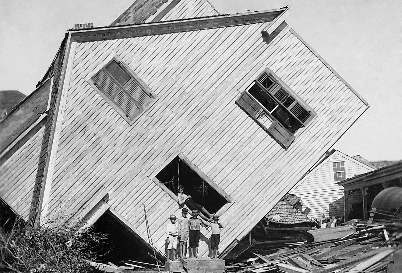 A house tipped on side after the 15 foot storm surge of the Galveston Hurricane of Sept. 1900. Image credit Everett Collection via Shutterstock