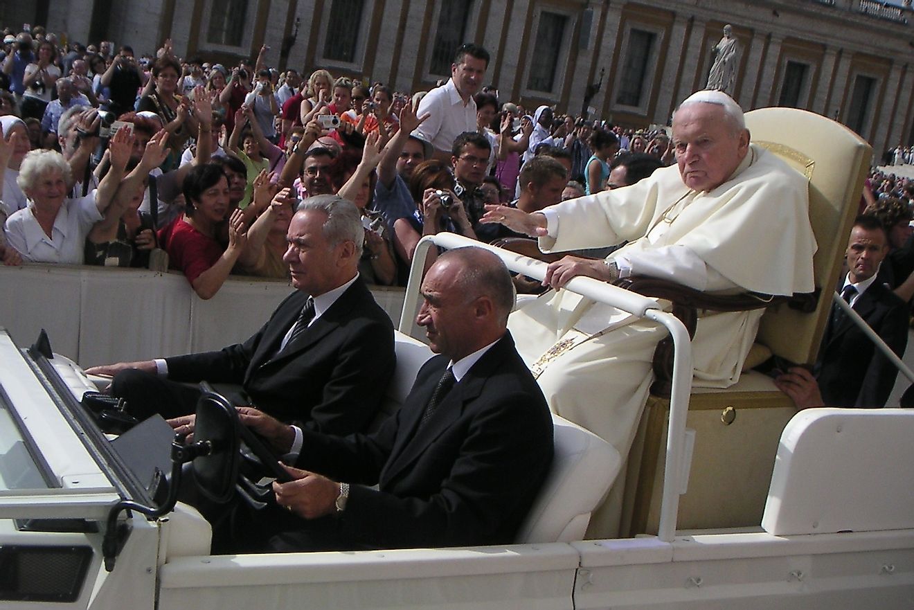 Pope John Paul II, one of longest serving popes (1978-2005), riding the Popemobile in St. Peter's Square in 2004.
