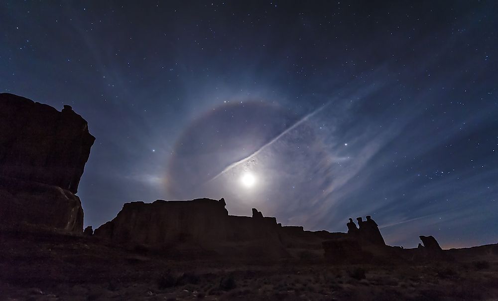 Moon haloes are formed when moonlight is refracted in ice crystals suspended in the atmosphere. 