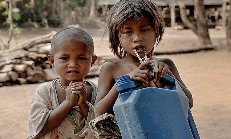 Children in a remote village in Laos; remote villages in the country have little access to improved healthcare facilities.