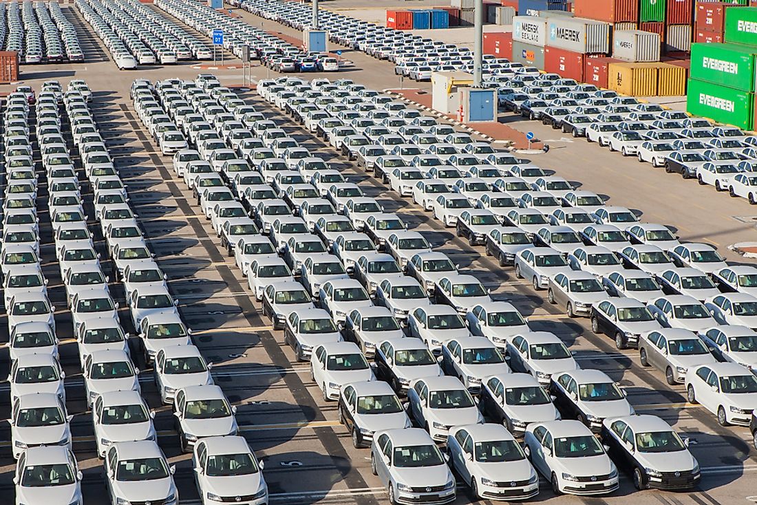New cars await export in Haifa, Israel. Editorial credit: StockStudio / Shutterstock.com.