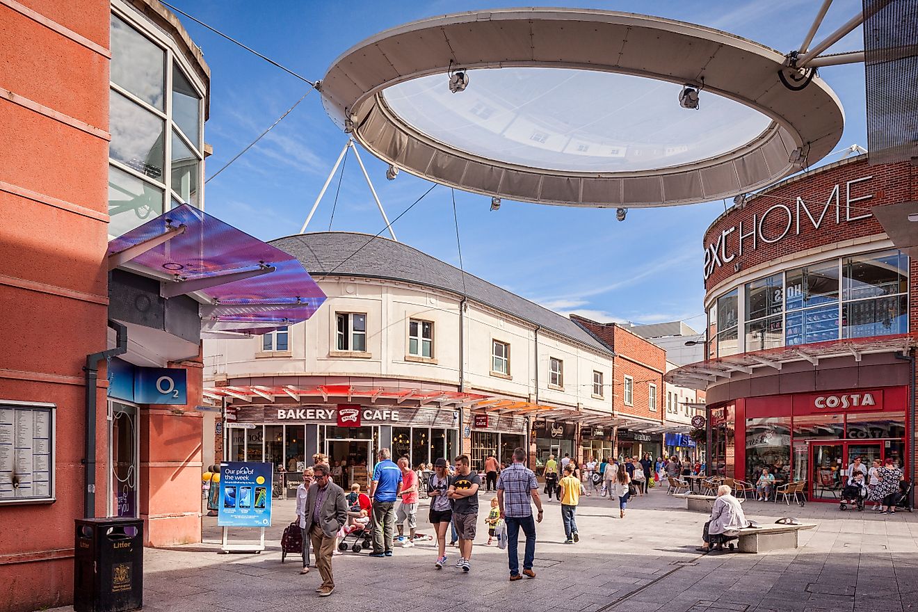View of a shopping area in Workington, England. (Image Credit - travellight via Shutterstock.com)