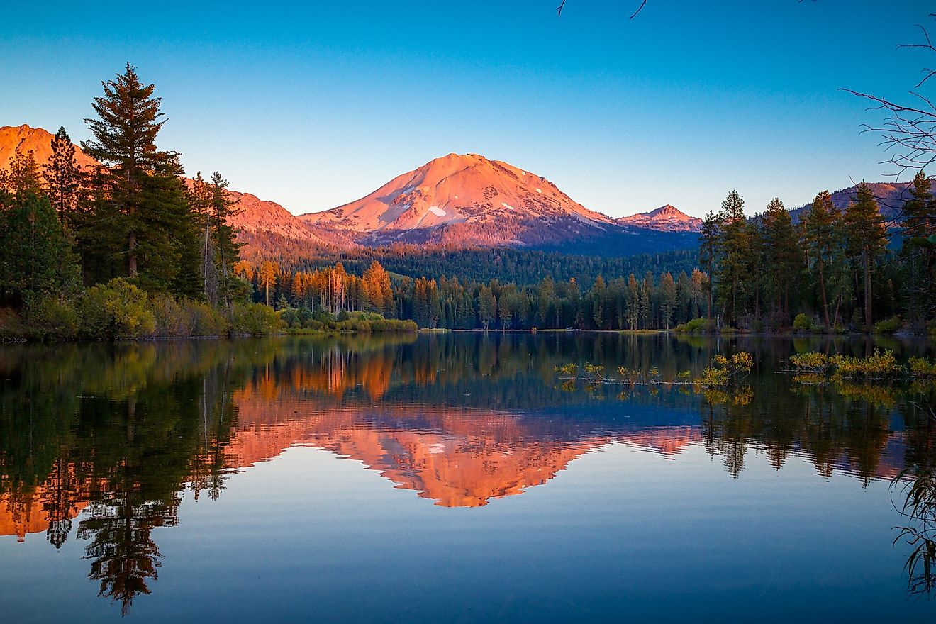 Sunset at Lassen Peak with reflection on Manzanita Lake, Lassen Volcanic National Park, California