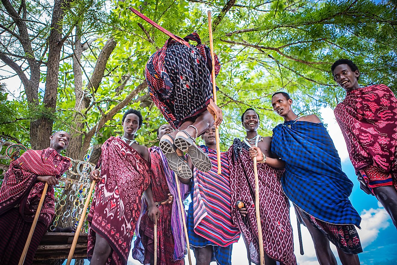 Maasai warriors dance ritual dance in a village in Tanzania. Image credit: Borys Shulman/Shutterstock.com