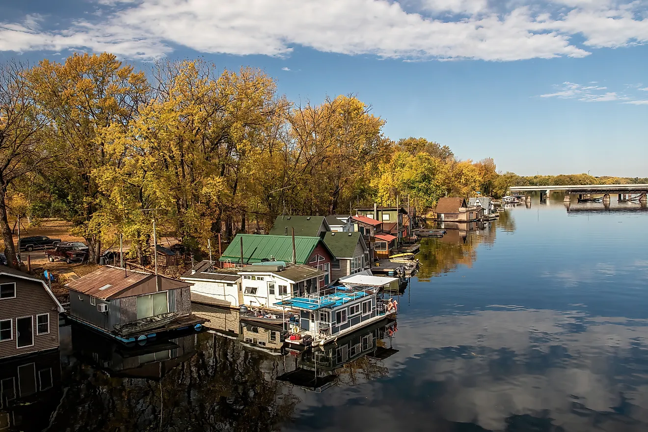 Winona, Minnesota USA October 12, 2022 Houseboats on Latsch Island in the backwaters of the Mississippi River on an autumn morning, taken from the Latsch Island Bridge in Winona, Minnesota USA.