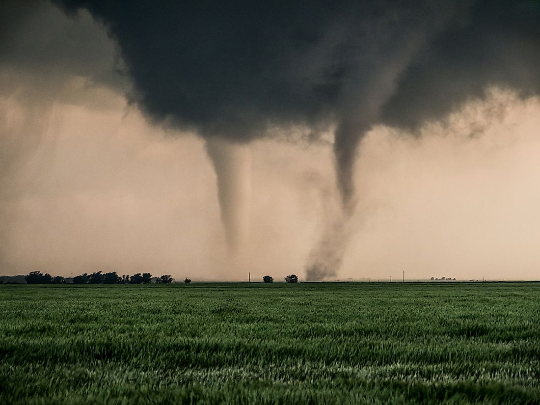 Tornadoes tear through a field in Oklahoma. 
