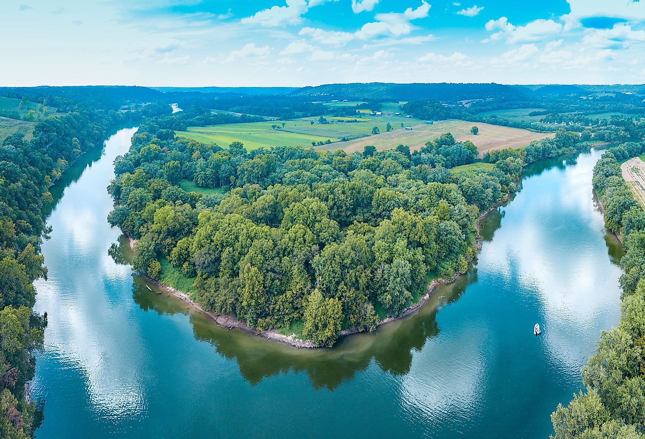 An aerial view panorama of the Kentucky river with a boat on the water. Image credit Cade Nathaniel Nicholson via Shutterstock.