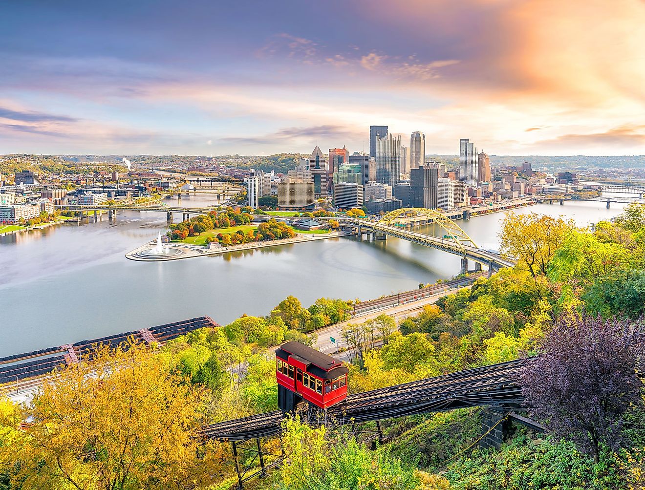 Downtown skyline of Pittsburgh, Pennsylvania at sunset. Image credit f11photo via shutterstock