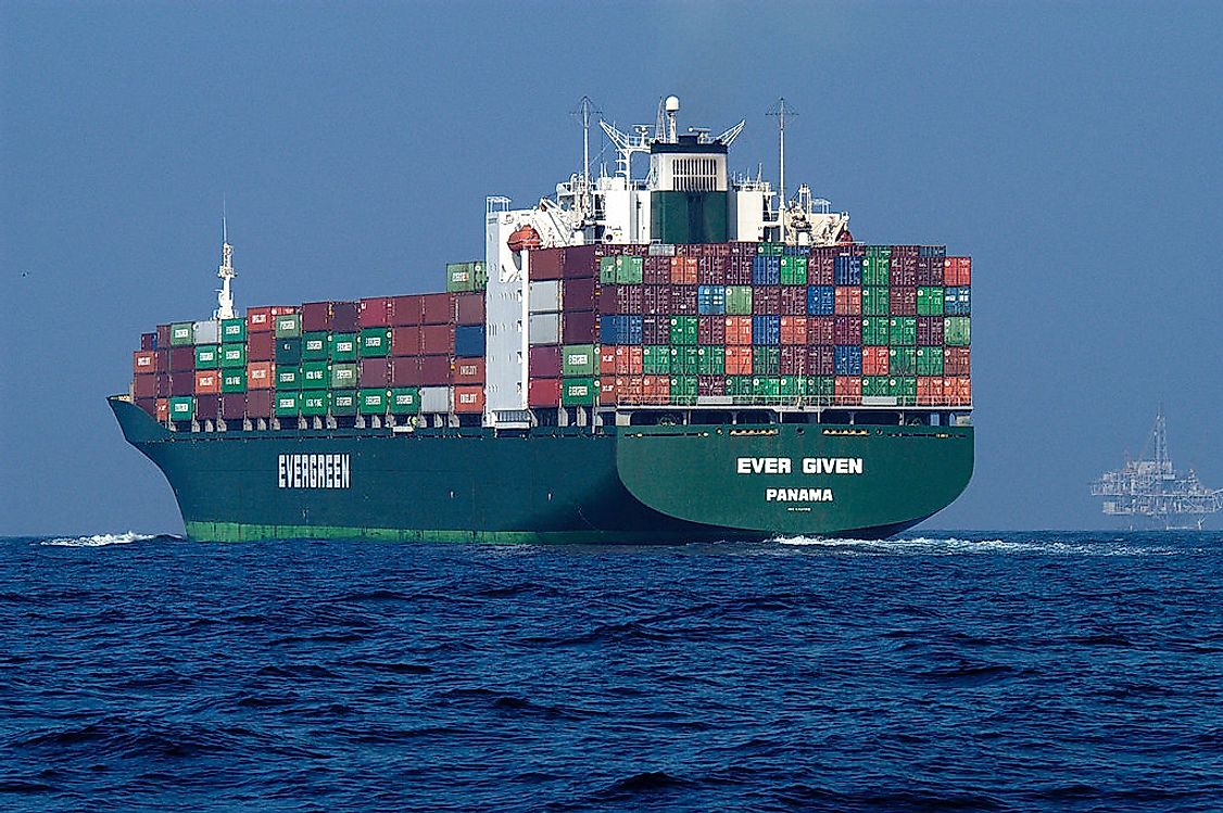 A container ship with a heavy cargo load sailing to the target destination.