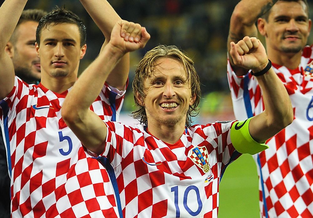 Luka Modrić with teamplayers. Credit: Oleh Dubyna / Shutterstock.com