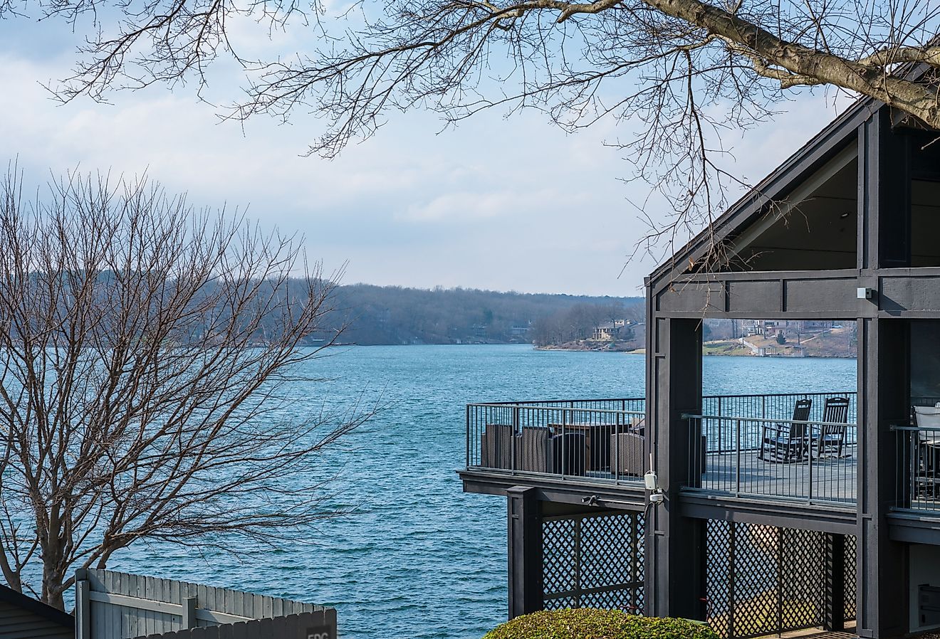 House on the lake in Northwest Arkansas, beautiful landscape view in Bella Vista. Image credit shuttersv via Shutterstock.