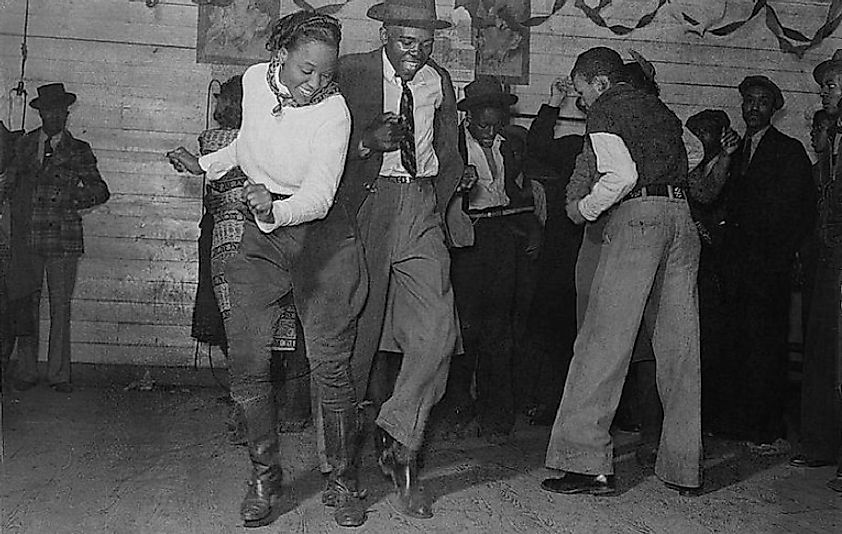 A young couple dancing the Jitterbug towards the end of the Great Depression.