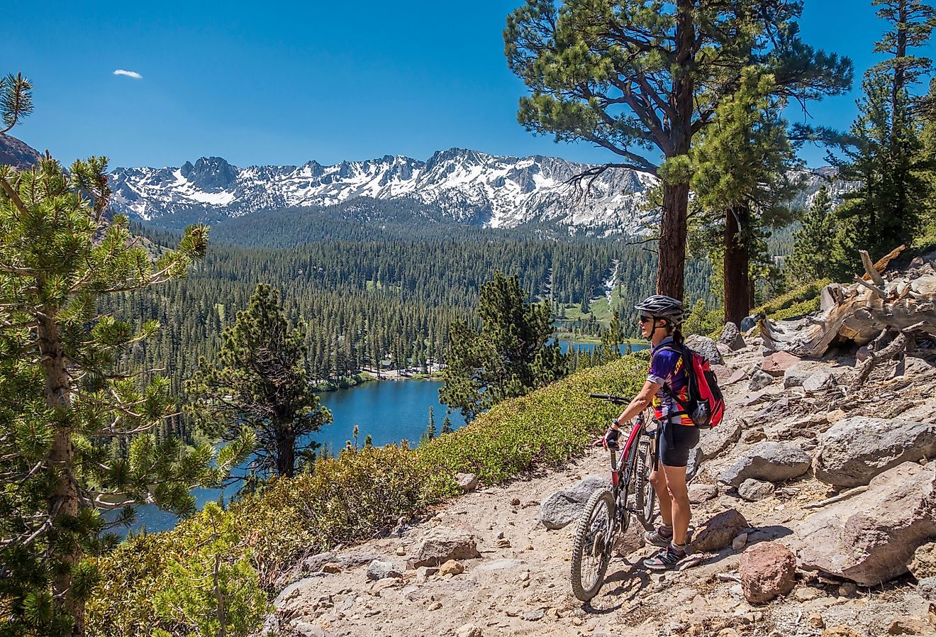 Woman on mountain bike taking in the view in Mammoth Lakes, California.