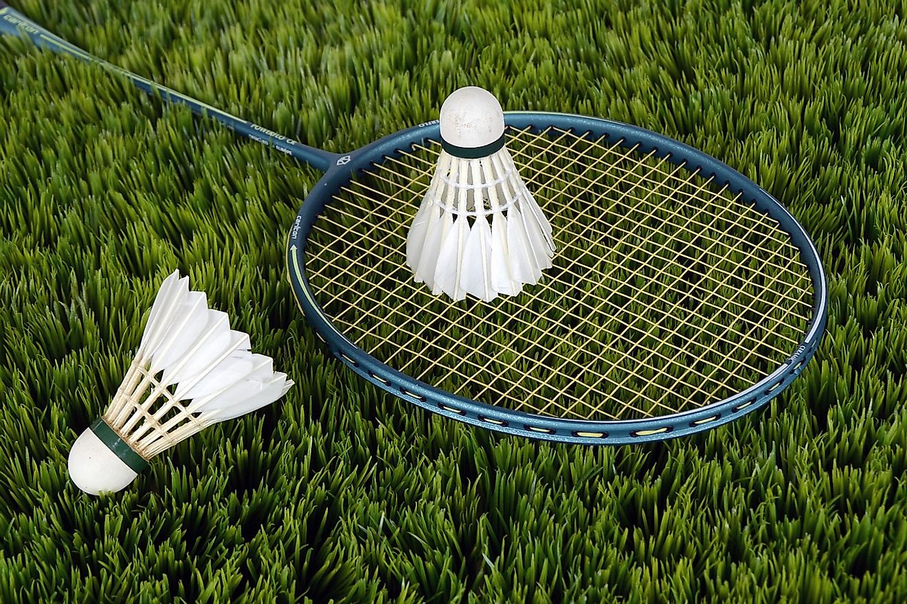 Badminton is played using a shuttlecock and racquet.