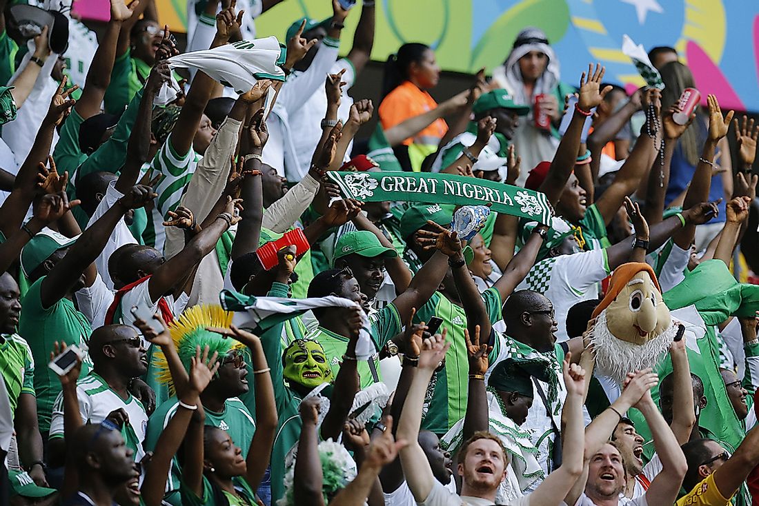 Fans of Nigeria national football cheer their team on. Editorial credit: AGIF / Shutterstock.com.