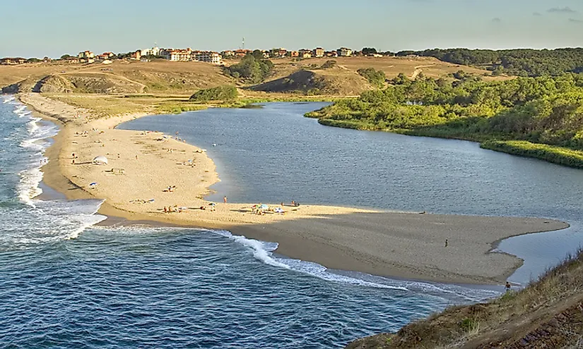 Longshore drift has deposited sediment along the shoreline which has led to the formation of a spit, Sinemorets, Bulgaria