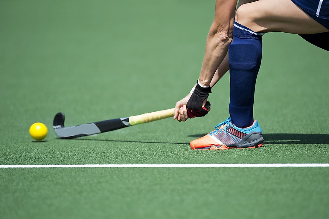 A field hockey player. 