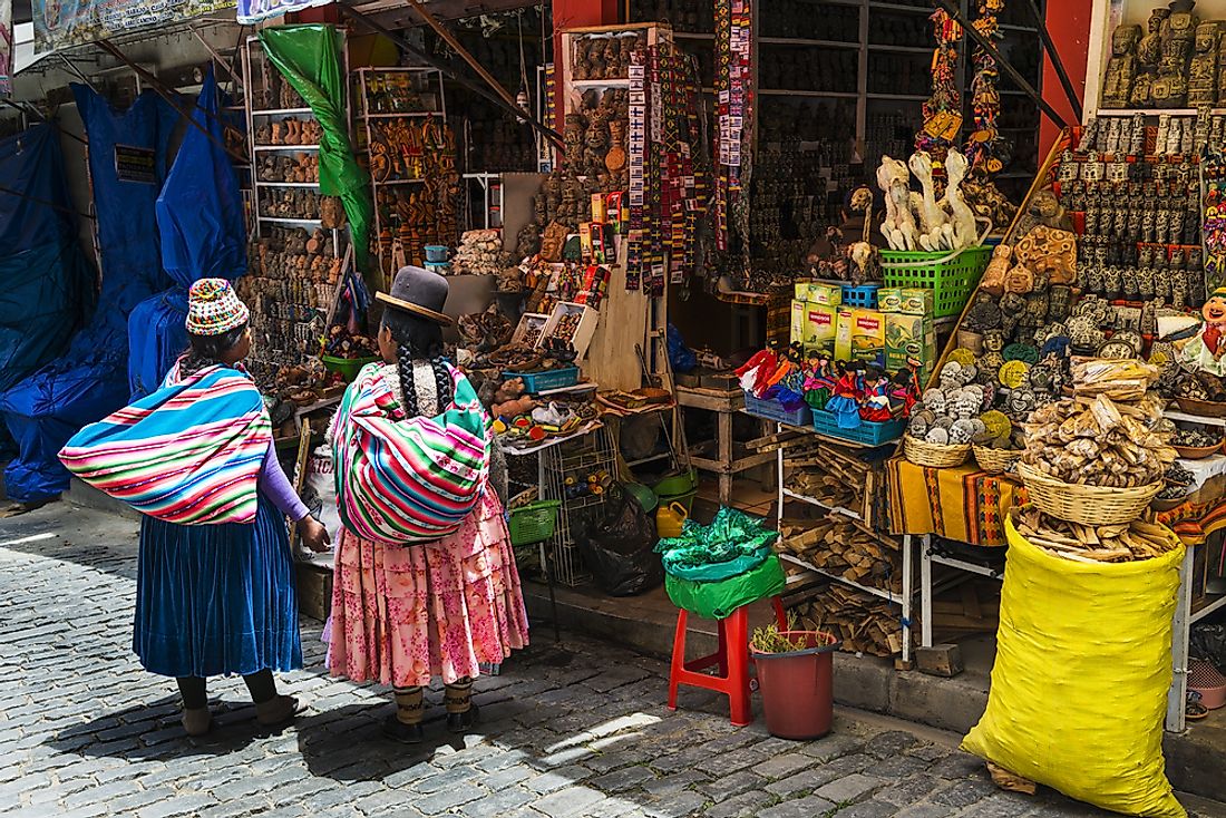 Indigenous Bolivian women shopping in La Paz, Bolivia. Editorial credit: Peek Creative Collective / Shutterstock.com